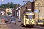 SNCV Tw 9120 erreicht das Zentrum von Courcelles, Rue Winston Churchill, 16.06.1987.