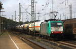 Die Cobra 2821 steht in Aachen-West mit einem langen Kesselzug aus Ludwigshafen-BASF nach Antwerpen-BASF(B) und wartet auf die Abfahrt nach Belgien. 
Aufgenommen vom Bahnsteig in Aachen-West. 
Bei Sonne und Wolken am Nachmittag vom 22.10.2017.