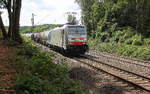 186 258-0 von Lineas/Railpool kommt die Gemmenicher-Rampe herunter nach Aachen-West mit einem Kesselzug aus Antwerpen-Kanaaldok(B) nach Millingen-Solvay(D). 
Aufgenommen an der Montzenroute am Gemmenicher-Weg. 
Bei Sommerwetter am Nachmittag vom 30.7.2018.