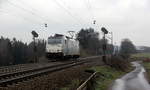 186 422-2 von der Rurtalbahn kommt als Lokzug von Aachen-West nach Belgien und fährt die Gemmenicher-Rampe hoch. 
Aufgenommen an der Montzenroute am Gemmenicher-Weg. 
Bei Sonne und Regenwolken am Nachmittag vom 22.2.2019.