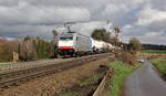 186 451-1 von Lineas/Railpool kommt aus Richtung Aachen-West mit viel Sand die Gemmenicher-Rampe hoch mit einem lagen Kesselzug aus Ludwigshafen-BASF nach Antwerpen-BASF(B) und fährt in Richtung Montzen/Belgien. 
Aufgenommen an der Montzenroute am Gemmenicher-Weg.
Bei Sonne und Regenwolken am Mittag vom 5.3.2019. 