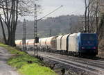 Ein Nachschuss von der 185 510-5 von Railtraxx fährt als Schubhilfe sie schiebt einem schweren Güterzug aus Linz Voestalpine(A) nach Antwerpen Waaslandhaven(B) bis zum Gemmenicher-Tunnel. Vorne fährt die Class 66 6601 von Captrain fährt jetzt für Railtraxx.
Aufgenommen an der Montzenroute am Gemmenicher-Weg. 
Bei Sonne und Regenwolken am Nachmittag vom 7.3.2019.