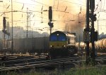 Die Class 66 PB14 von Railtraxx BVBA fhrt mit viel Qualm in Aachen-West ab. Sie zieht einen Containerzug in Richtung Belgien in der Abendstimmung am 2.6.2012.