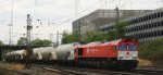 Die Class 66 DE6310  Griet  von Crossrail kommt aus Richtung Montzen/Belgien mit einem Kurzen Silozug aus Herentals(B) nach Poznen(PL) und fhrt in Aachen-West ein bei Sonne mit Wolken am 28.4.2013.