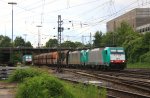 Zwei Cobra 2815 und 2826 kommen mit einem langen Kalkzug aus Yves-Gomeze(B) nach Millingen und fahren in Aachen-West ein und im Hintergrund steht die Cobra 2808 in Aachen-West bei Gewitterwarung am