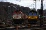 Die Class 66 DE6312  Alix  von Crossrail steht in Aachen-West und wartet auf die Abfahrt nach Antwerpen-Berendrecht(B) mit einem sehr langen MSC-Containerzug, und auf dem Nebengleis rangiert eine Class 66 PB15 von Railtraxx BVBA in Aachen-West am Nachmittag vom 4.1.2014. 