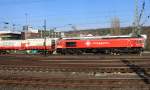 Die Class 66 DE6311  Hanna  von Crossrail fährt viel Dieselpower mit einem langen Containerzug aus Segrate(I) nach Zeebrugge-Ramskapelle(B) bei der Ausfahrt aus Aachen-West und fährt in Richtung Montzen/Belgien. Aufgenommen vom Bahnsteig in Aachen-West bei schönem Frühlingswetter am 28.3.2014.