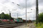 Die Cobra 2836  fährt mit einem langen Containerzug aus Gallarate(I) nach Zeebrugge(B) bei der Ausfahrt aus Aachen-West und fährt in Richtung Montzen/Belgien. 
Bei Sonne und Regenwolken am Nachmittag vom 5.7.2014.