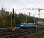 Die Cobra 2824 rangiert in Aachen-West.
Aufgenommen vom Bahnsteig in Aachen-West. 
Bei Sonne und Regenwolken am Vormittag vom 15.11.2014.