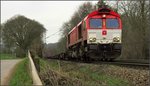 Eine Crossrail Class 66 kommt mit ihrer Güterfracht die Gemmenicher Rampe hinab nach Aachen West. Hier zu sehen auf der Montzenroute unweit von Aachen am Friedrichweg ,02.April 2016.