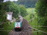 Die Cobra 2804  kommt die Gemmenicher-Rampe hochgefahren aus Aachen-West mit einem langen Kesselzug aus Ludwigshafen-BASF nach Antwerpen-BASF(B) und fährt gleich in den Gemmenicher-Tunnel hinein und fährt in Richtung Montzen/Vise(B). 
Aufgenommen in Reinartzkehl an der Montzenroute. 
Bei Sonne und Gewitterwolken am Mittag vom 27.5.2016.