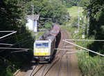 186 177-2  der Euro Cargo Rail kommt aus Richtung Aachen-West und fährt die Gemmenicher-Rampe hoch mit einem Schrottzug aus Köln-Kalk(D) nach Genk-Goederen(B) und fährt gleich in den Gemmenicher-Tunnel hinein und fährt in Richtung Montzen/Vise(B). Aufgenommen in Reinartzkehl an der Montzenroute. 
Bei Sommerwetter am Nachmittag vom 22.8.2016.