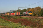 Die DE6309 von Crossrail zieht einen Containerzug durch Lummen Richtung Hasselt und weiter nach Aachen-West. Aufgenommen am 14/10/2017.