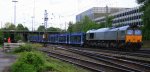 Die Class 66 DE6307 von DLC Railways kommt aus Richtung Montzen/Belgien mit einem langen Dacia-Autoleerzug aus Tongeren(B) nach Ciumesti(RO) und fhrt in Aachen-West ein in der Abendsonne am Abend des