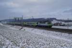 Re 420 501-9 zieht ...  Sandro Gadola 23.01.2011