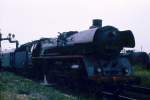 BR 01 10 An einem tr�ben Tag im Fr�hjahr 1976 h�lt 03 0010-3 mit D 552 von Berlin-Lichtenberg nach Stralsund zum Wasserfassen in Angem�nde.