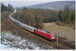 DB 101.044 mit dem EN491 (Hamburg-Wien) bei Eichgraben; 10.3.2010.  ...