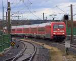 BR 101 mit Zugen 101 049-5 nach einem Regenschauer bei der Einfahrt von Petershausen mit ihrem RE200 aus N�rnberg am Hacken. 28.03.2010