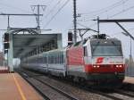 1014 003 mit einem EC bei der Einfahrt in Wien ...
