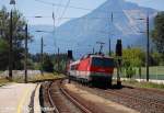 br-1044 Kaum war die eine RoLa weg,kam auch schon die N�chste,diesmal aber in die Gegenrichtung
1044 111-3 zog ihre halb ausgelastete Fuhre nach W�rgl-Terminal,Brixlegg (�sterreichurlaub 20.08.09)