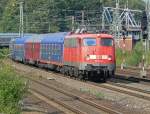 br-110-bugelfalte 110 324-1 mit Autoslaaptrein in K�ln-West am 30.07.2010