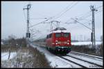br-110-e-10 110 284 mit IC 1809 aus Rostock auf dem Weg nach Hamburg. Aufgenommen am 03.01.10 in Sildemow.
