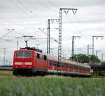 BR 111 mit Zugen 111 176 mit RB von Regensburg Hbf nach Plattling am 02.06.2010 bei der Durchfahrt durch Regensburg Ost.