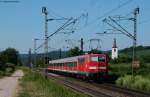 BR 111 mit Zugen RE 31100 (Freiburg(Breisgau) Hbf-Offenburg) mit Schublok 111 060-0 bei Denzlingen 8.7.10