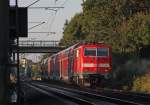 BR 111 mit Zugen 111 012 schiebt den 15-Minuten versp�teten RE10437 nach Dortmund, hier kurz vor Geilenkirchen, 18.7.10