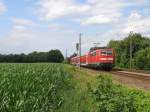 BR 111 mit Zugen 111 135-0 mit RE 14123 Emden Hauptbahnhof-M�nster Hauptbahnhof bei Deverm�hlen am 16-7-2010.