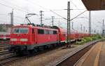 BR 111 mit Zugen 111 178 schiebt am 24.07.10 einen RE aus M�nchen kommend vor bei am S-Bahnhof D�rrenhof Richtung N�rnberg Hbf.