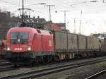 br-1116 �BB-Taurus 1116 072-8 mit langem G�terzug in K�ln West.