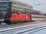 1116 197-3 mit dem Eurocity 112 am Heimeranplatz.  ...