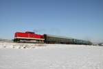 BR 112 112 565 der Erzgebirgsbahn vor einem Sonderzug am 20.12.09 nahe Zw�nitz