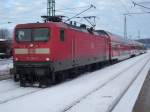 BR 112 Cottbuser 112 106 und vierteilige Rostocker Doppelstockeinheit so hielt am 04.Februar 2010 der RE 33216 Sassnitz-Rostock in Bergen/R�gen.