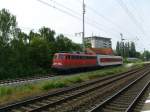 BR 113 268-7 zieht einen CNL-Wagen richtung Hamburg. Elmshorn 1. ...
