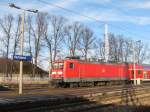 114 028 erreicht am 29.12. 09 mit ihrem RE nach Falkenberg ...