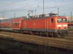 BR114-0318 in Berlin Lichtenberg mit einen Zug nach Stralsund ...