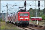 114 018-5 f�hrt mit RE33111 -nach Wittenberg- in den Bhf ...