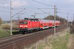 114 101-9 mit einer Regionalbahn nach Braunschweig in Magdeburg Diesdorf. ...