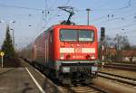 BR 114 114 027-6 schiebt am 18.03.'10 ihren RE aus dem Bahnhof Ruhland 