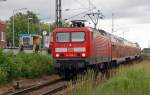 114 024 erreicht mit einem RE 3 am 12.06.10 Blankenfelde. ...