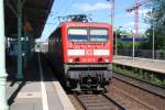 Berlin, 16.06.2010, 114 011-0 als RB14 nach Nauen beim Halt ...