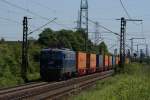 1142.635-0 der SVG mit einem Containerzug bei der Durchfahrt durch ...