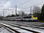 BR 13 SNCB-Lok 1347 mit dem IC A Eupen - Ostende am Haken biegt hier von dem eingleisigen St�ck zwischen Eupen und Herbesthal auf die Linie 37 (deutsche Grenze - L�ttich)und wird in einigen hundert Meter im Bhf Welkenraedt den ersten Halt einlegen. Aufgenommen in Herbesthal am 21/02/2010.