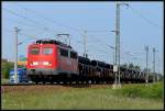 BR 140 mit Zugen 140 273-4 vor dem R�hrenzug -61343- nach Mukran, kurz vor Stralsund.  am 30.05.08 