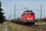 140 656-0 mit Rungenwagen in Wiesental am 22.07.09  ...
