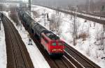 BR 140 mit Zugen 140 585 bespannt am 18.02.10 einen Kesselwagenzug durch Holzweissig Richtung Bitterfeld.