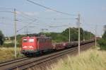 BR 140 mit Zugen Mit einem gemischten G�terzug f�hrt 140 374-0 in Richtung Braunschweig. Fotografiert am 16.07.2010 in Magdeburg Diesdorf. 