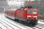 BR 143 mit Zugen Die 143 823 mit dem RE 13 in Wuppertal Elberfeld am 28,01,10